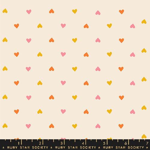 Cotton quilting fabric pattern called 'Hearts in Multi'. Part of the 'Juicy' fabric collection. Designed by Melody Miller for fabric company Ruby Star Society. SKU: RS0091 12. 44-45 inch width.