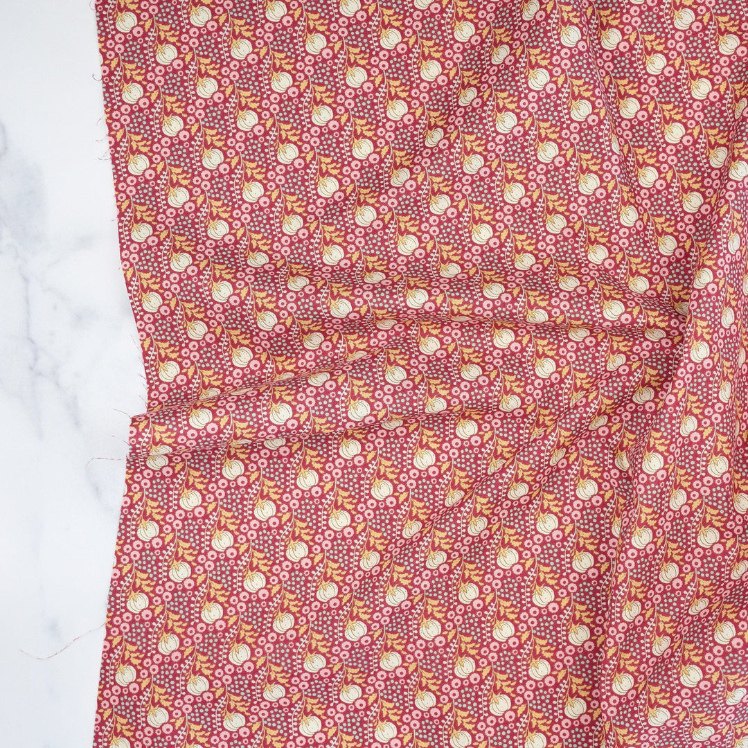 Cotton quilting fabric pattern called 'Cottonfield Maroon'. Part of the 'Sanctuary' fabric collection. Designed by Tone Finnanger for fabric company Tilda Fabrics. SKU: TIL100564. 44-45 inch width.