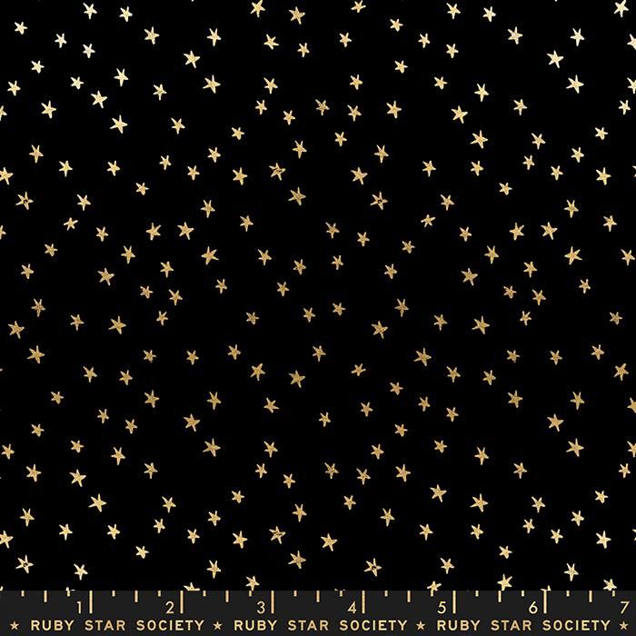 Cotton quilting fabric pattern called 'Mini Starry in Black Gold'. Part of the 'Starry' fabric collection. Designed by Ruby Star Society for fabric company Moda Fabrics. SKU: RS4110 27M. 44-45 inch width.