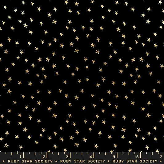 Cotton quilting fabric pattern called 'Mini Starry in Black Gold'. Part of the 'Starry' fabric collection. Designed by Ruby Star Society for fabric company Moda Fabrics. SKU: RS4110 27M. 44-45 inch width.