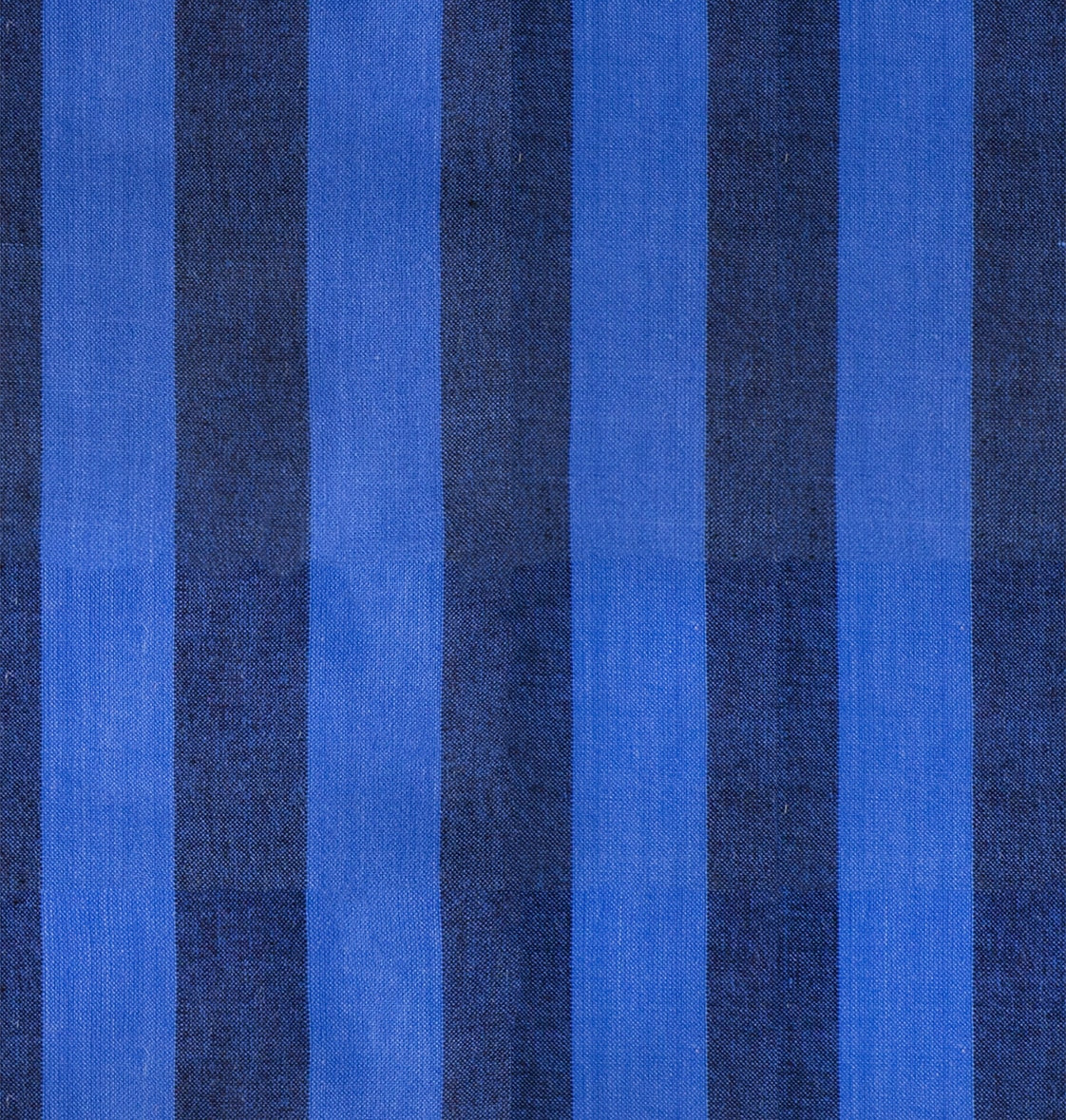 Blue vertical stripes cotton quilting fabric Warp Weft Daisy Days by Ruby Star Society's Alexia Abegg. Alternating wide cobalt and navy blue stripes.