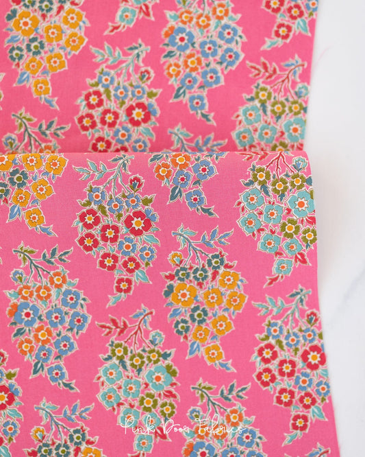 Cotton quilting fabric pattern called 'Willy Nilly in Pink'. Part of the 'Pie in the Sky' fabric collection. Designed by Tilda Fabrics for fabric company Tilda Fabrics. SKU: 100494. 44-45 inch width.