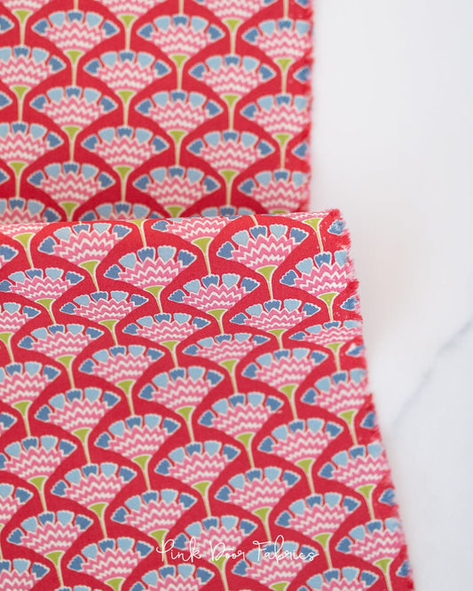 Cotton quilting fabric pattern called 'Tasselflower in Red'. Part of the 'Pie in the Sky' fabric collection. Designed by Tilda Fabrics for fabric company Tilda Fabrics. SKU: 100495. 44-45 inch width.