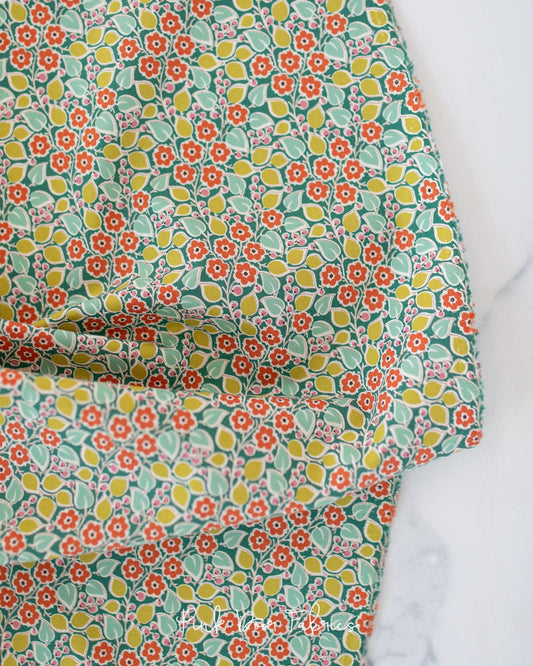 Cotton quilting fabric pattern called 'Topsy Turvy in Pine'. Part of the 'Pie in the Sky' fabric collection. Designed by Tilda Fabrics for fabric company Tilda Fabrics. SKU: 100499. 44-45 inch width.