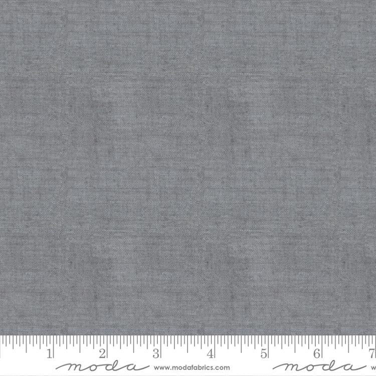 Cotton quilting fabric pattern called 'Crossweave in Cement'. Part of the 'Crossweave' fabric collection. Designed by Moda Fabrics for fabric company Moda Fabrics. SKU: 12216 30. 44-45 inch width.