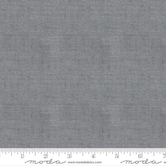 Cotton quilting fabric pattern called 'Crossweave in Cement'. Part of the 'Crossweave' fabric collection. Designed by Moda Fabrics for fabric company Moda Fabrics. SKU: 12216 30. 44-45 inch width.
