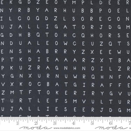 Cotton quilting fabric pattern called 'Word Search in Black'. Part of the 'ABC...xyz' fabric collection. Designed by Stacey Iest Hsu for fabric company Moda Fabrics. SKU: 20818 20. 44-45 inch width.