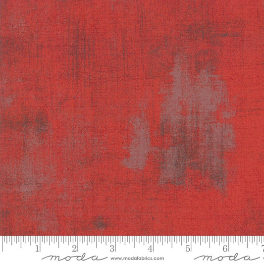 Cotton quilting fabric pattern called 'Grunge in Red'. Part of the 'Grunge Basics' fabric collection. Designed by Basic Grey for fabric company Moda Fabrics. SKU: 30150 151. 44-45 inch width.