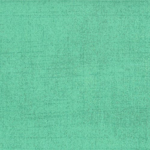 Cotton quilting fabric pattern called 'Grunge in Aqua'. Part of the 'Grunge Basics' fabric collection. Designed by Basic Grey for fabric company Moda Fabrics. SKU: 30150-154. 44-45 inch width.
