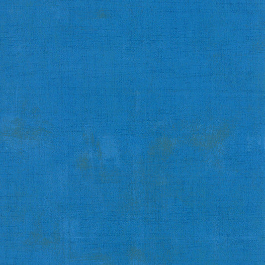 Cotton quilting fabric pattern called 'Grunge in Sapphire'. Part of the 'Grunge Basics' fabric collection. Designed by Basic Grey for fabric company Moda Fabrics. SKU: 30150 221. 44-45 inch width.