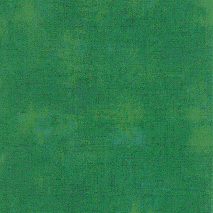 Cotton quilting fabric pattern called 'Grunge in Kelly Green'. Part of the 'Grunge Basics' fabric collection. Designed by Basic Grey for fabric company Moda Fabrics. SKU: 30150 232. 44-45 inch width.