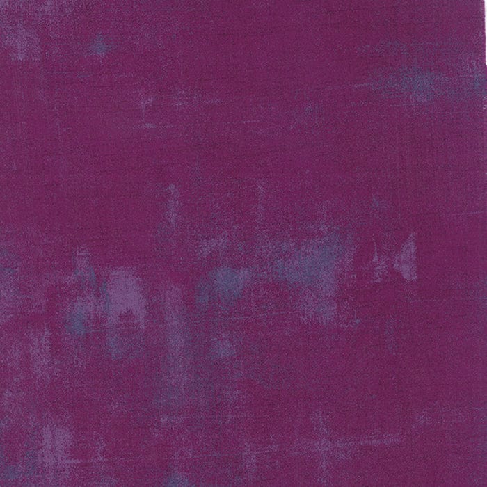 Cotton quilting fabric pattern called 'Grunge in Plum'. Part of the 'Grunge Basics' fabric collection. Designed by Basic Grey for fabric company Moda Fabrics. SKU: 30150 243. 44-45 inch width.