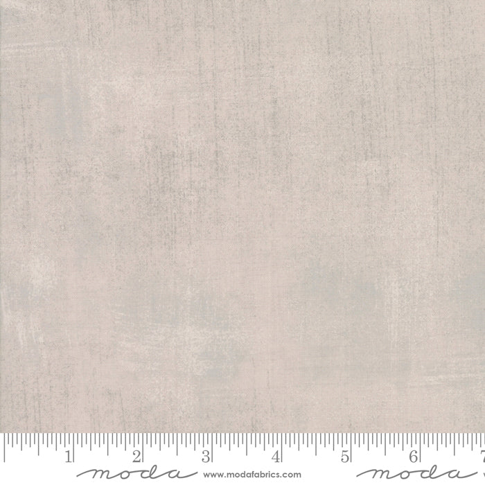 Cotton quilting fabric pattern called 'Grunge in Taupe'. Part of the 'Grunge Basics' fabric collection. Designed by Basic Grey for fabric company Moda Fabrics. SKU: 30150 359. 44-45 inch width.