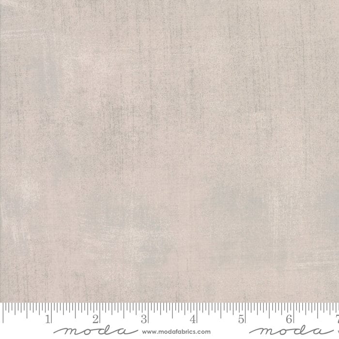 Cotton quilting fabric pattern called 'Grunge in Taupe'. Part of the 'Grunge Basics' fabric collection. Designed by Basic Grey for fabric company Moda Fabrics. SKU: 30150 359. 44-45 inch width.