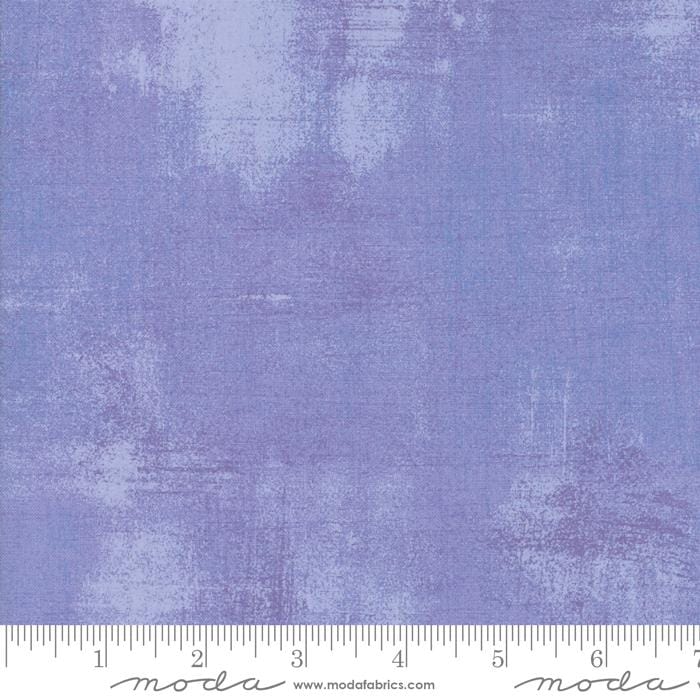 Cotton quilting fabric pattern called 'Grunge in Sweet Lavender'. Part of the 'Grunge Basics' fabric collection. Designed by Basic Grey for fabric company Moda Fabrics. SKU: 30150 383. 44-45 inch width.