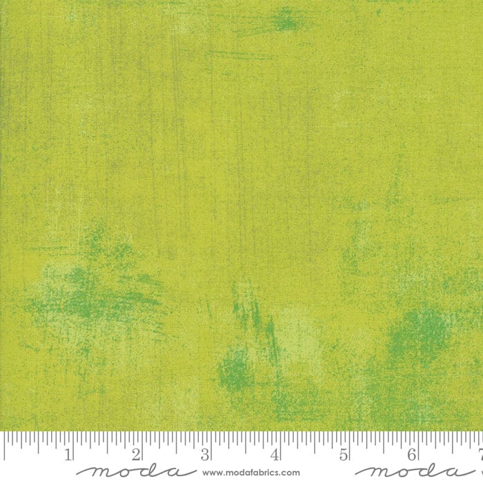Cotton quilting fabric pattern called 'Grunge in Lime Punch'. Part of the 'Grunge Basics' fabric collection. Designed by Basic Grey for fabric company Moda Fabrics. SKU: 30150 412. 44-45 inch width.