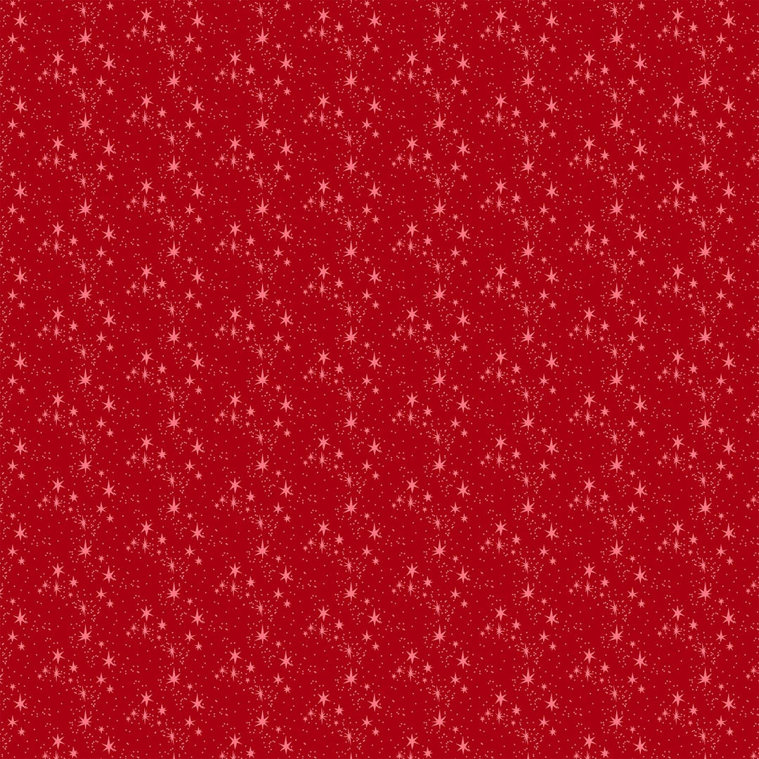 Cotton quilting fabric pattern called 'Stars in Red'. Part of the 'Merry Kitchmas' fabric collection. Designed by Louise Pretzel for fabric company Figo Fabrics. SKU: 90672-26. 44-45 inch width.