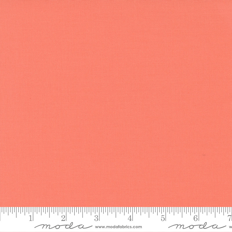 Cotton quilting fabric pattern called 'Coral'. Part of the 'Bella Solids' fabric collection. Designed by Moda Fabrics for fabric company Moda Fabrics. SKU: 9900 147. 44-45 inch width.