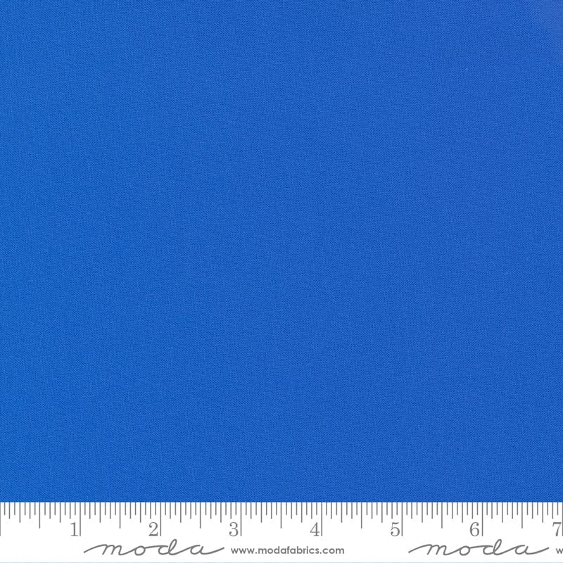Cotton quilting fabric pattern called 'Amelia Blue'. Part of the 'Bella Solids' fabric collection. Designed by Moda Fabrics for fabric company Moda Fabrics. SKU: 9900 167. 44-45 inch width.