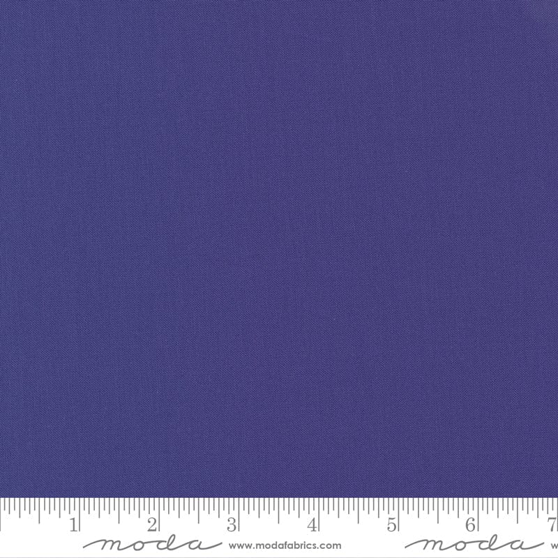 Cotton quilting fabric pattern called 'Terrain Iris'. Part of the 'Bella Solids' fabric collection. Designed by Moda Fabrics for fabric company Moda Fabrics. SKU: 9900 168. 44-45 inch width.