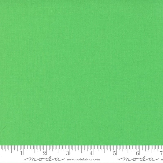 Cotton quilting fabric pattern called 'Kiwi'. Part of the 'Bella Solids' fabric collection. Designed by Moda Fabrics for fabric company Moda Fabrics. SKU: 9900 189. 44-45 inch width.