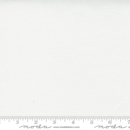Cotton quilting fabric pattern called 'Off White'. Part of the 'Bella Solids' fabric collection. Designed by Moda Fabrics for fabric company Moda Fabrics. SKU: 9900 200. 44-45 inch width.