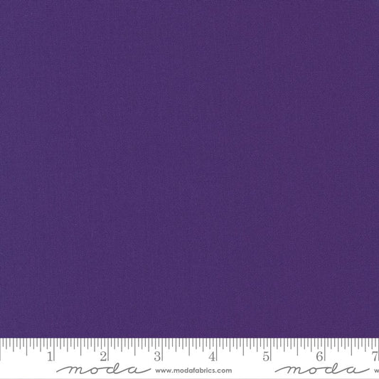 Cotton quilting fabric pattern called 'Purple'. Part of the 'Bella Solids' fabric collection. Designed by Moda Fabrics for fabric company Moda Fabrics. SKU: 9900 21. 44-45 inch width.