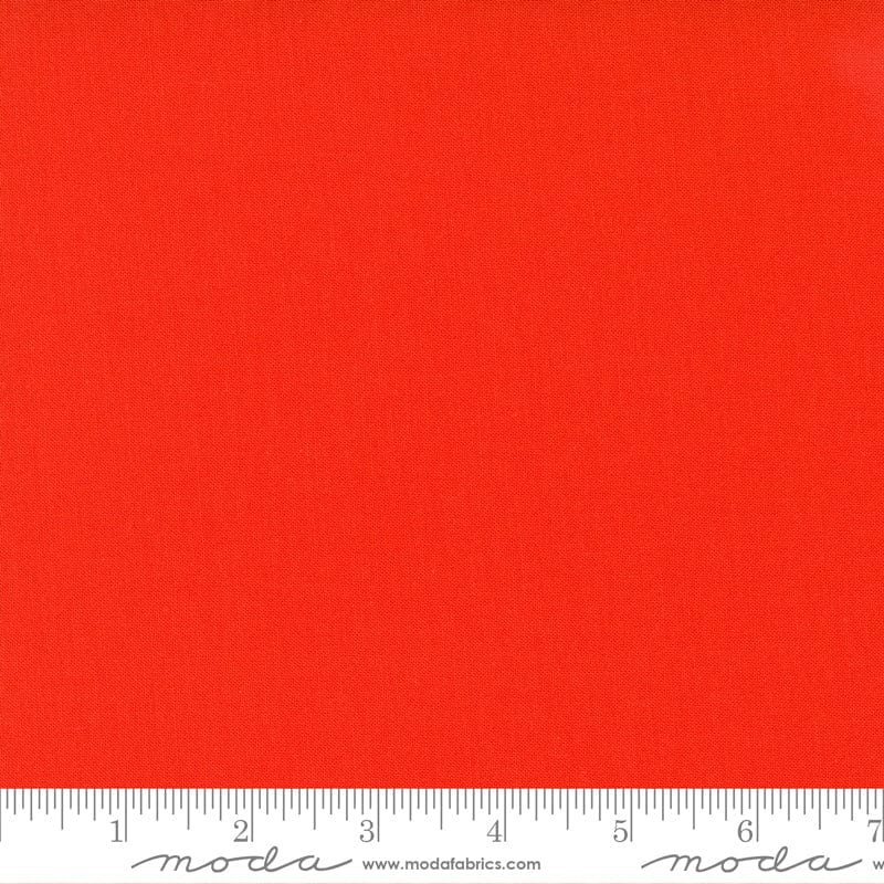 Cotton quilting fabric pattern called 'Mango'. Part of the 'Bella Solids' fabric collection. Designed by Moda Fabrics for fabric company Moda Fabrics. SKU: 9900 222. 44-45 inch width.