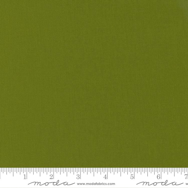 Cotton quilting fabric pattern called 'Avocado'. Part of the 'Bella Solids' fabric collection. Designed by Moda Fabrics for fabric company Moda Fabrics. SKU: 9900 277. 44-45 inch width.