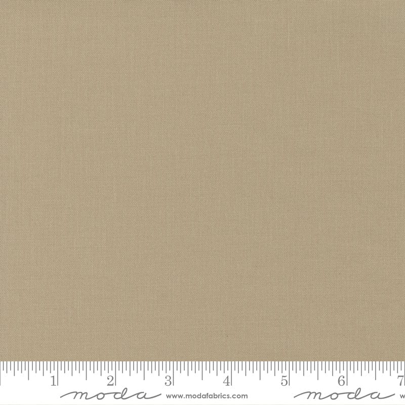 Cotton quilting fabric pattern called 'Oatmeal'. Part of the 'Bella Solids' fabric collection. Designed by Moda Fabrics for fabric company Moda Fabrics. SKU: 9900 313. 44-45 inch width.