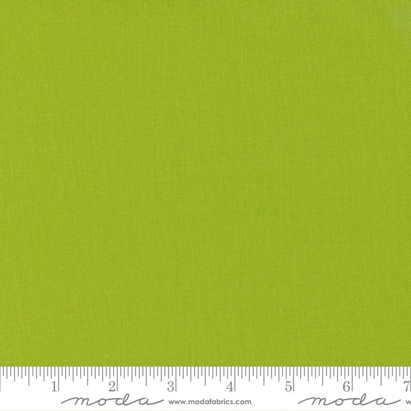 Cotton quilting fabric pattern called 'Limeade'. Part of the 'Bella Solids' fabric collection. Designed by Moda Fabrics for fabric company Moda Fabrics. SKU: 9900 369. 44-45 inch width.