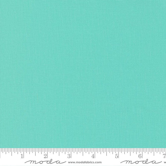 Cotton quilting fabric pattern called 'Seaglass'. Part of the 'Bella Sollids' fabric collection. Designed by Moda Fabrics for fabric company Moda Fabrics. SKU: 9900 378. 44-45 inch width.