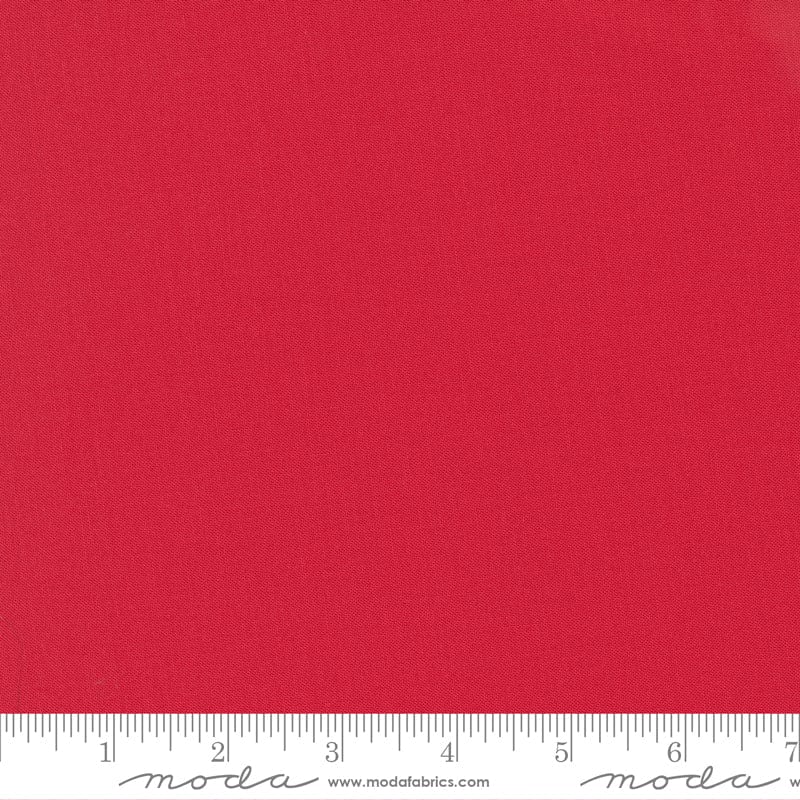 Cotton quilting fabric pattern called 'Scarlet'. Part of the 'Bella Solids' fabric collection. Designed by Moda Fabrics for fabric company Moda Fabrics. SKU: 9900 47. 44-45 inch width.