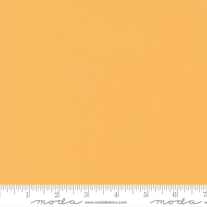 Cotton quilting fabric pattern called 'Goldenrod'. Part of the 'Bella Solids' fabric collection. Designed by Moda Fabrics for fabric company Moda Fabrics. SKU: 9900 81. 44-45 inch width.