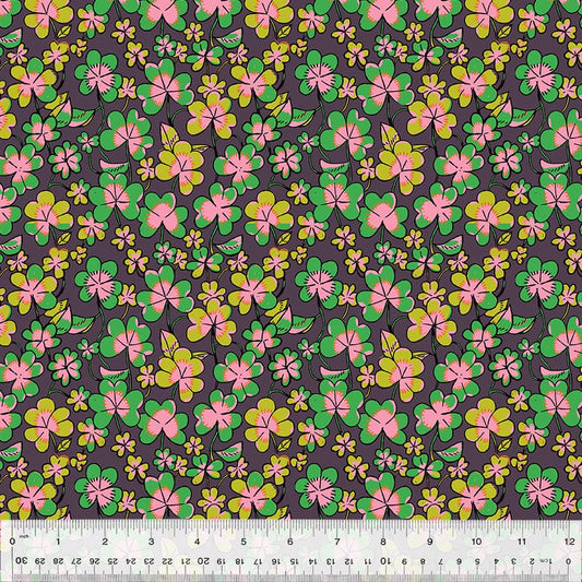 Cotton quilting fabric pattern called 'Clover in Eggplant'. Part of the 'Forestburgh' fabric collection. Designed by Heather Ross for fabric company Windham Fabrics. SKU: 53847-9. 44-45 inch width.