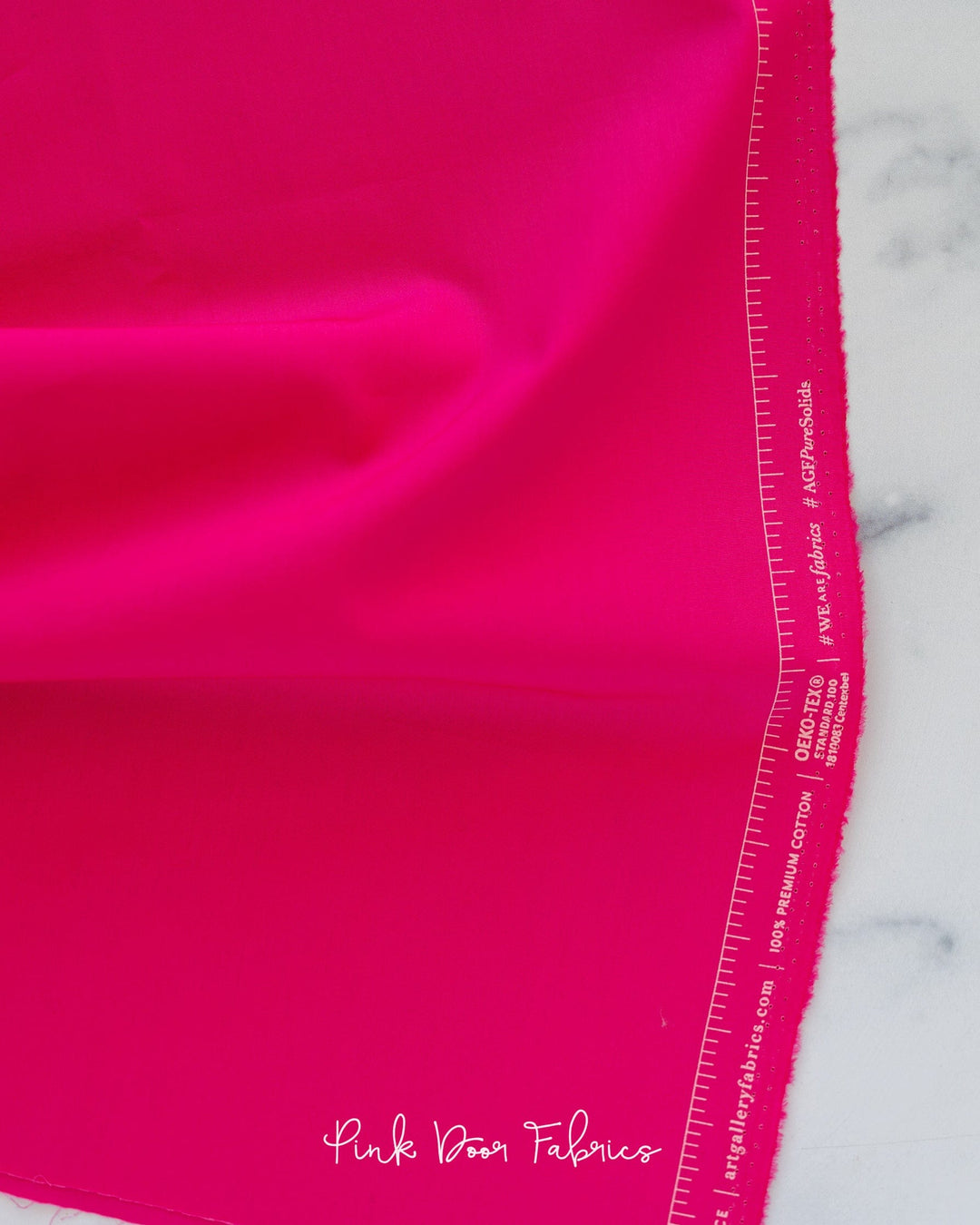 Cotton quilting fabric pattern called 'Raspberry Rose'. Part of the 'Pure Solids' fabric collection. Designed by Art Gallery Fabrics for fabric company Art Gallery Fabrics. SKU: PE-439. 44-45 inch width.