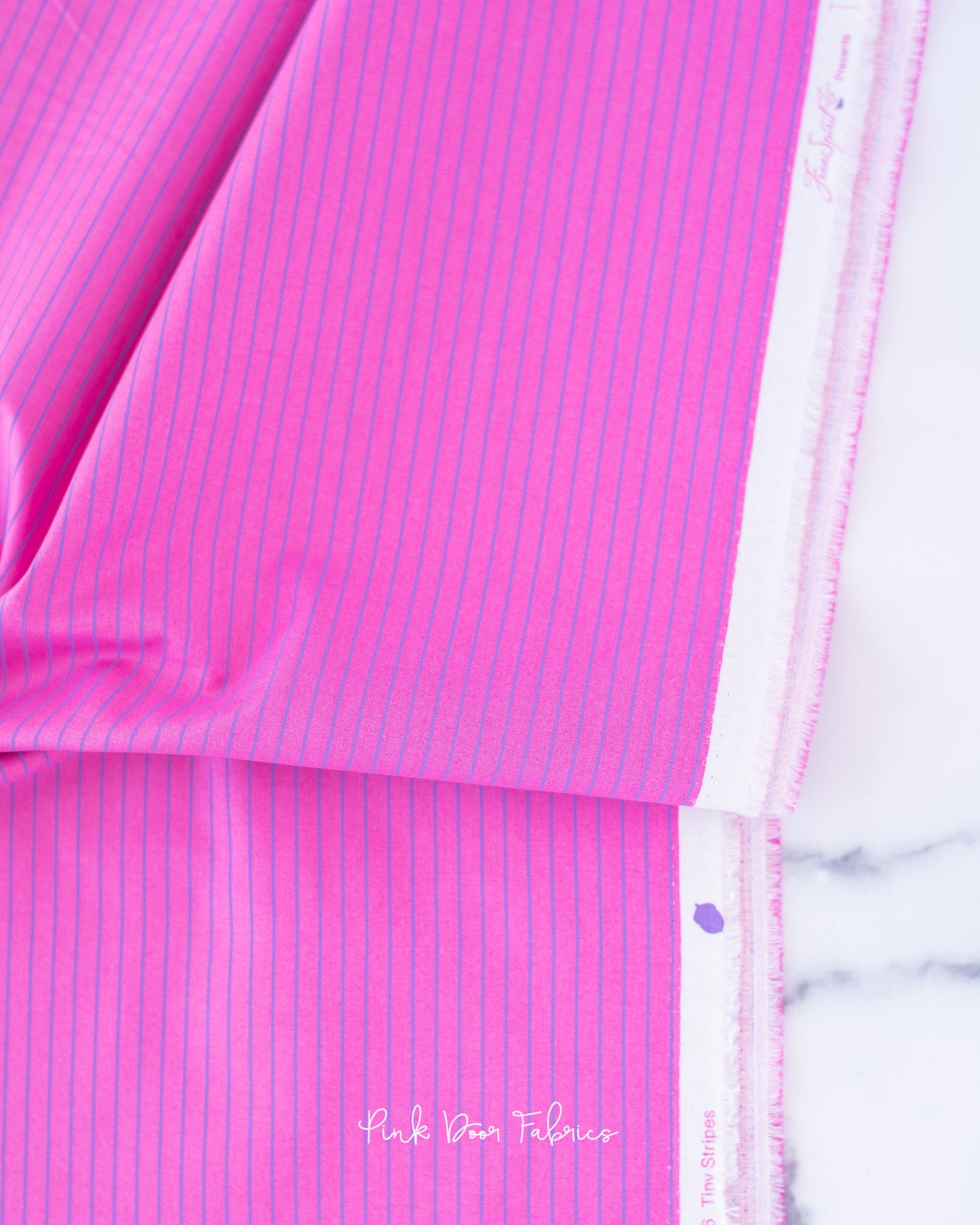 Cotton quilting fabric pattern called 'Tiny Stripes in Mystic'. Part of the 'True Colors' fabric collection. Designed by Tula Pink for fabric company Free Spirit Fabrics. SKU: PWTP186.MYSTIC. 44-45 inch width.