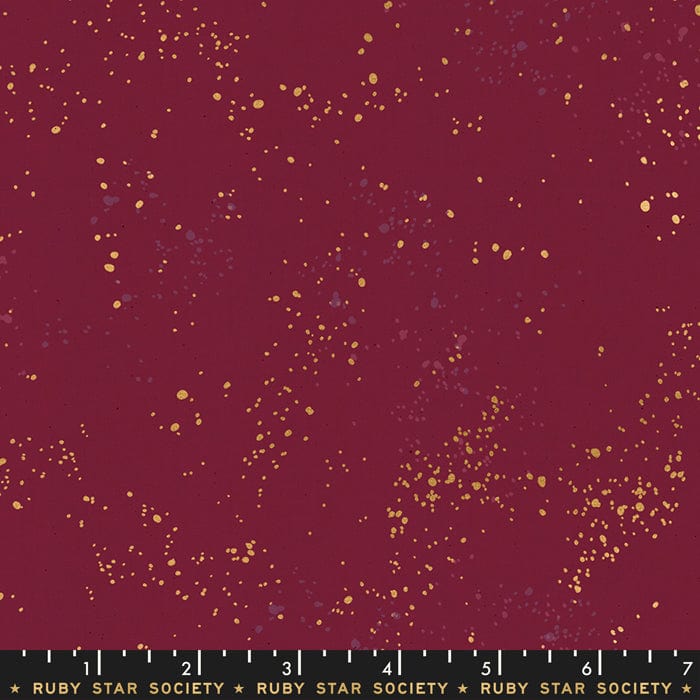 Cotton quilting fabric pattern called 'Wine Time'. Part of the 'Speckled Metallic' fabric collection. Designed by Ruby Star Society for fabric company Moda Fabrics. SKU: RS5027 36M. 44-45 inch width.