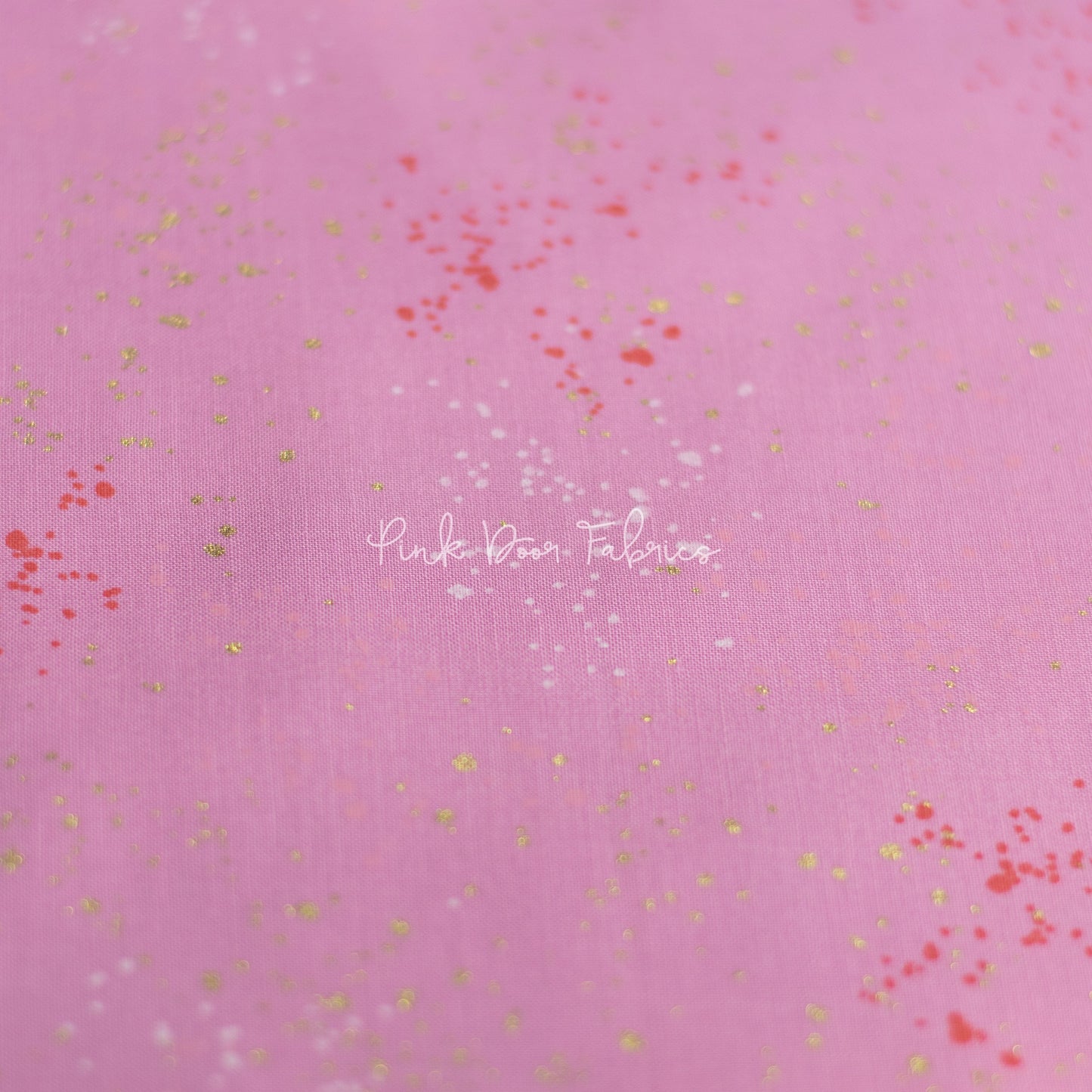 Cotton quilting fabric pattern called 'Daisy'. Part of the 'Speckled Metallic' fabric collection. Designed by Ruby Star Society for fabric company Moda Fabrics. SKU: RS5027 41M. 44-45 inch width.