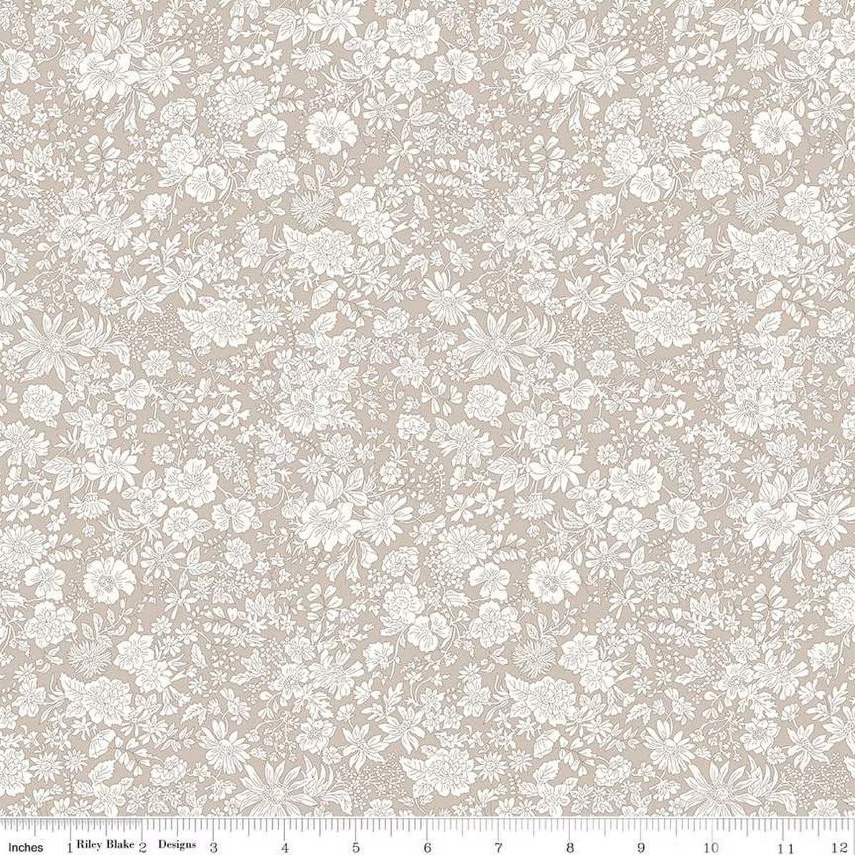 A closeup shot of the quilting fabric pattern called Oatmeal, part of Liberty Fabric's Emily Belle fabric collection by Riley Blake. SKU is 01666419A.