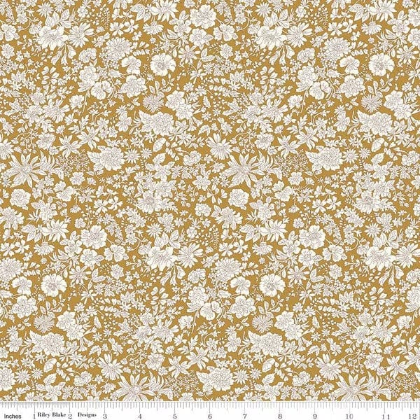 A closeup shot of the quilting fabric pattern called Golden Ochre, part of Liberty Fabric's Emily Belle fabric collection by Riley Blake. SKU is 01666431A.