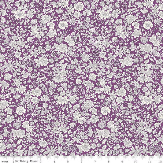 A closeup shot of the quilting fabric pattern called Plum, part of Liberty Fabric's Emily Belle fabric collection by Riley Blake. SKU is 01666443A.