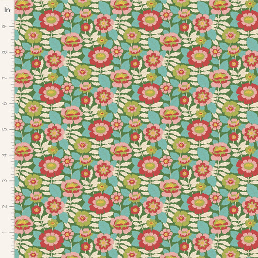 A closeup shot of the quilting fabric pattern called Beverly, designed by Tone Finnanger, in the green colorway. The SKU is TIL100609.