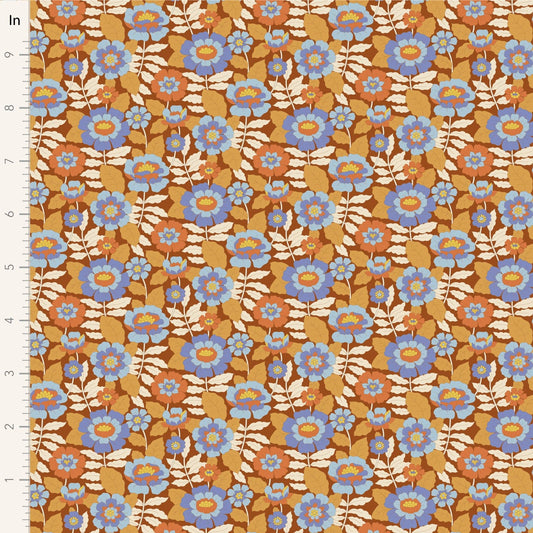 A closeup shot of the quilting fabric pattern called Beverly, designed by Tone Finnanger, in the caramel colorway. The SKU is TIL100612.