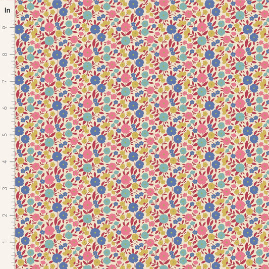 A closeup shot of the quilting fabric pattern called Janice, designed by Tone Finnanger, in the red colorway. The SKU is TIL100614.