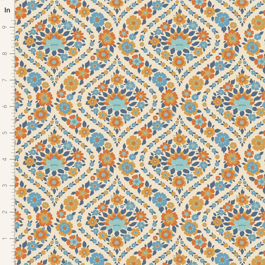 A closeup shot of the quilting fabric pattern called Bianca, designed by Tone Finnanger, in the blue colorway. The SKU is TIL100619.