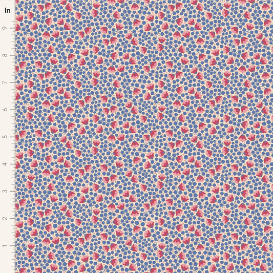 A closeup shot of the quilting fabric pattern called Bellflower, designed by Tone Finnanger, in the denim colorway. The SKU is TIL110131.