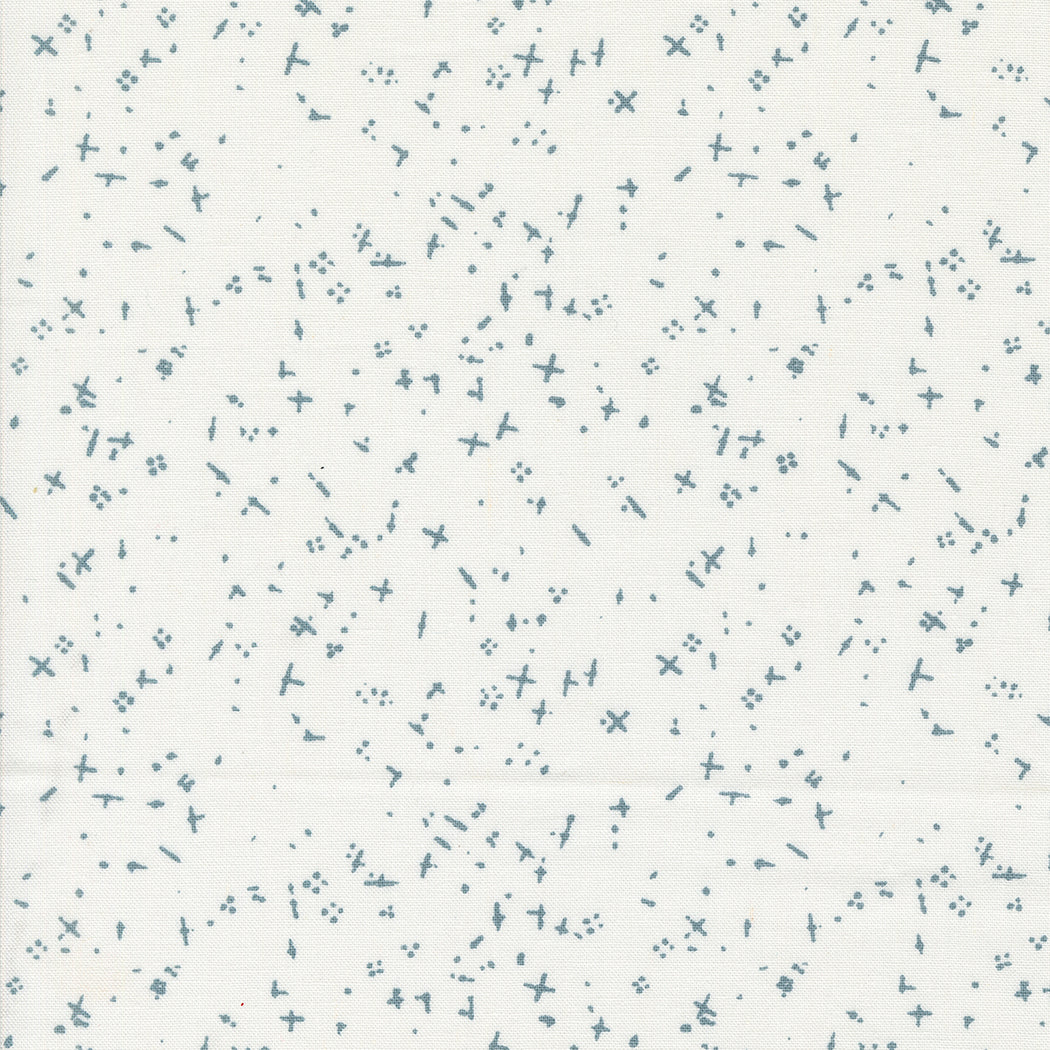 Cotton quilting fabric pattern called 'Scattered in White'. Part of the 'Still More Paper' fabric collection. Designed by Zen Chic for fabric company MODA. SKU: -9890. 44-45 inch width.