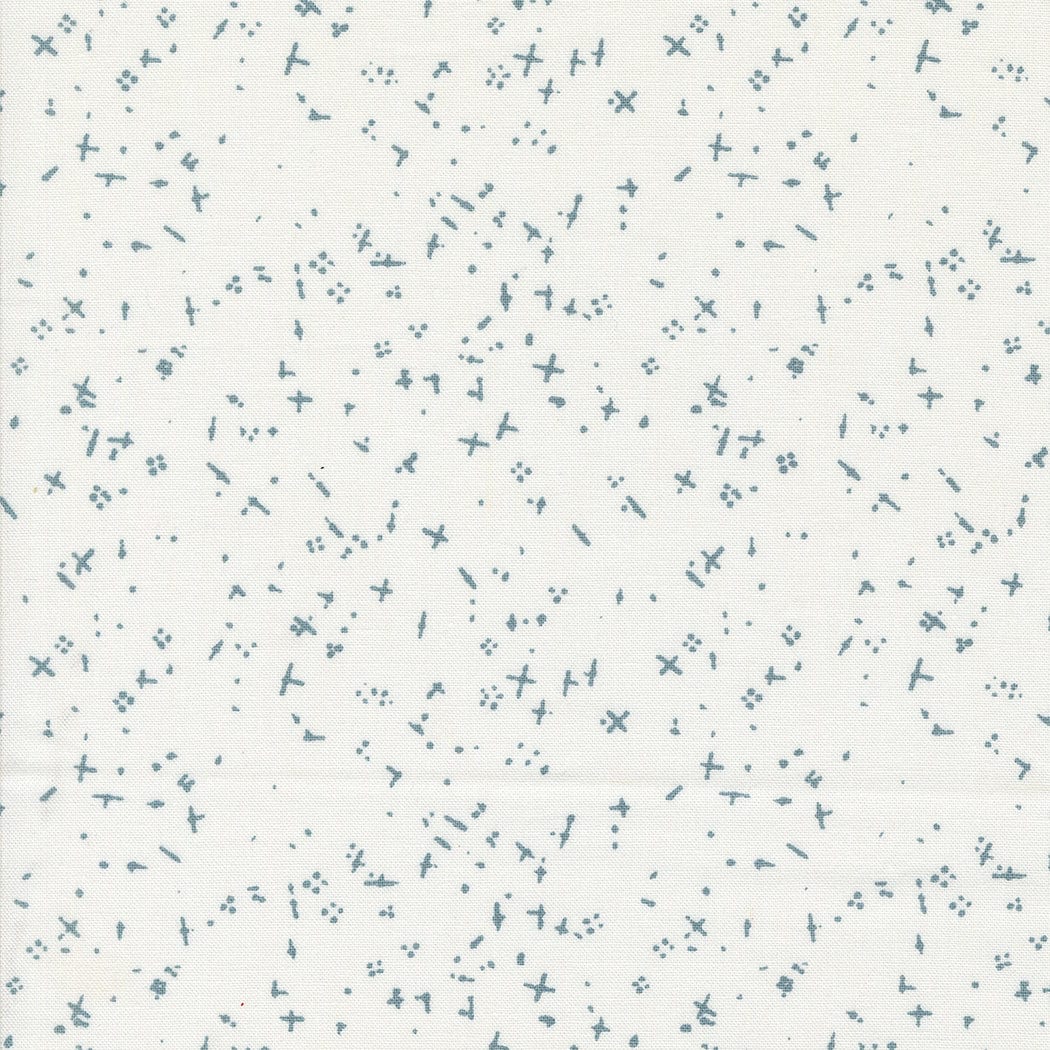 Cotton quilting fabric pattern called 'Scattered in White'. Part of the 'Still More Paper' fabric collection. Designed by Zen Chic for fabric company MODA. SKU: -9890. 44-45 inch width.