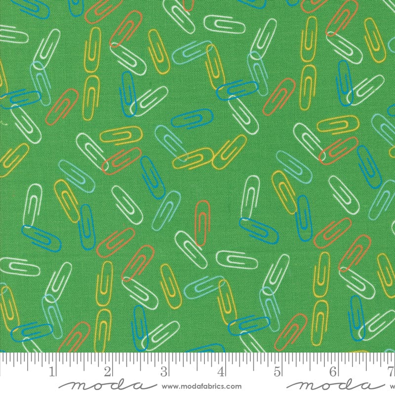 Cotton quilting fabric pattern called 'Clip It in Grass'. Part of the 'Back to School' fabric collection. Designed by Stacy Iest Hsu for fabric company MODA. SKU: 20896 17. 44-45 inch width.
